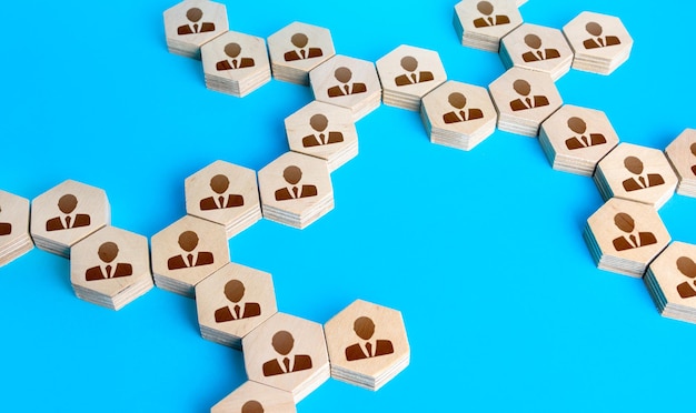 an expanded network of connected chains of people cooperation for solving tasks networking connecting groups of people uniting around idea assistance and collaboration unity and diversity