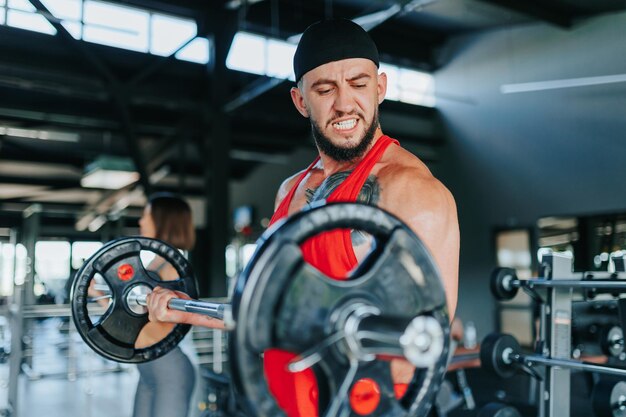 Experience the essence of a challenging workout with this powerful image of a caucasian male athlete