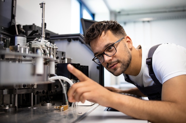 Experienced engineer working on new automated robotic machine