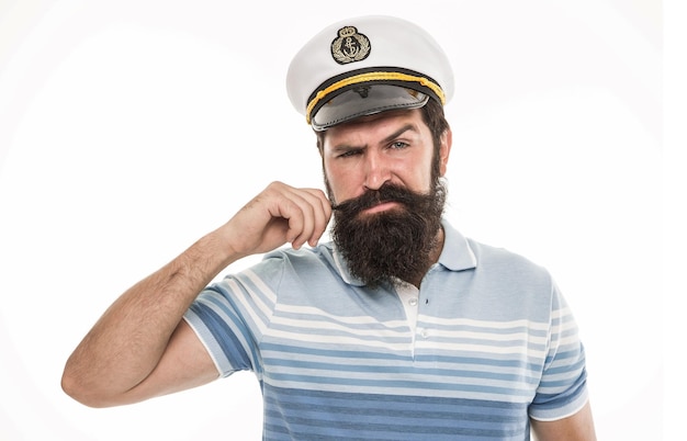 Фото Опытный моряк-капитан бородатый моряк, изолированный на белом концепция морских и морских приключений моряк или моряк с длинной бородой и усами профессиональный моряк морская еда владелец корабля