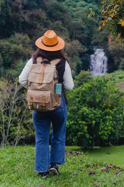 Exploring natural wonder in Xico Veracruz Woman enjoying the waterfall