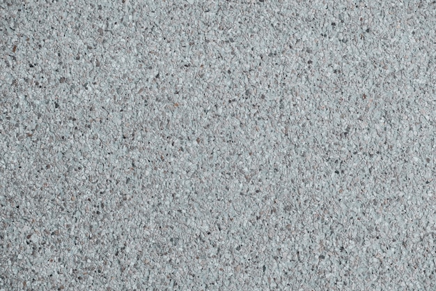 Explsed aggregate finish concrete wall and floor background texture.