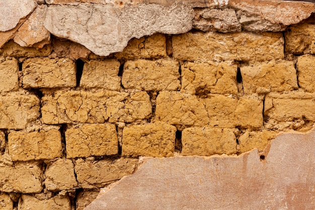 Exposed brick wall with cement