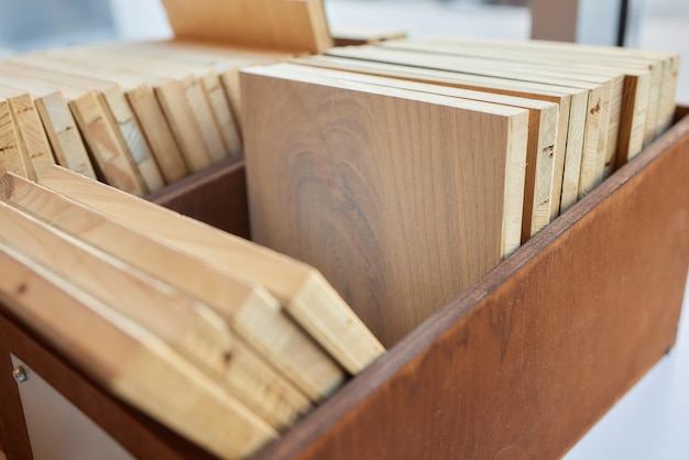 Exposition of different wooden staves in showroom