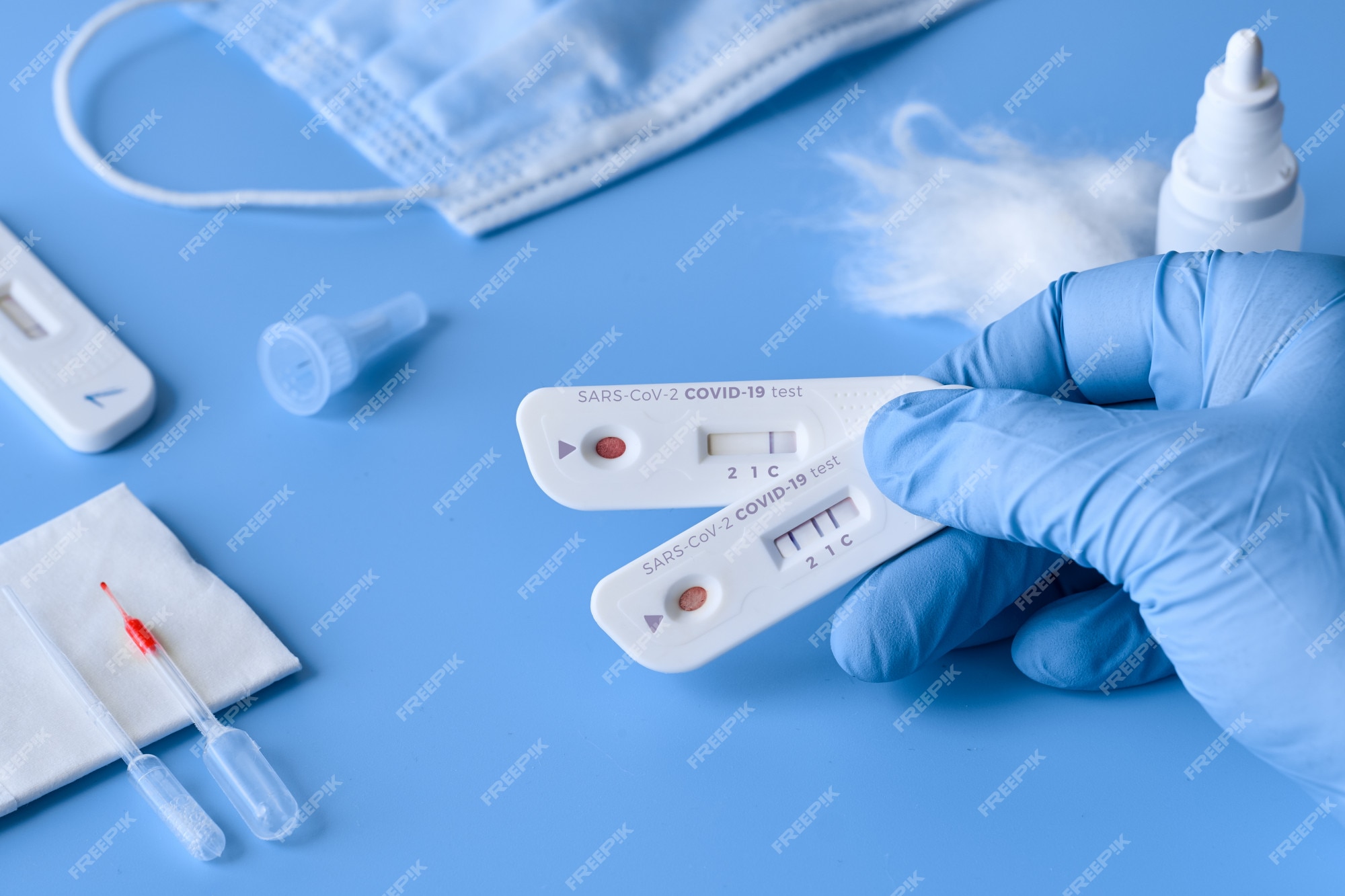 Premium Photo  Express covid-19 test for igm and igg antibodies to novel  coronavirus sars-cov-2, covid-19. nurse hand in glove collects patient  blood with disposable pipette. purple neon background.