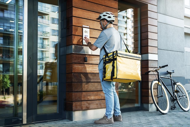 Express food delivery courier with insulated bag using
intercom