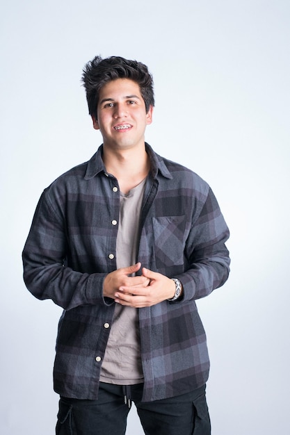 expression of youth and happiness. portrait of a caucasian latin american teenager with black hair