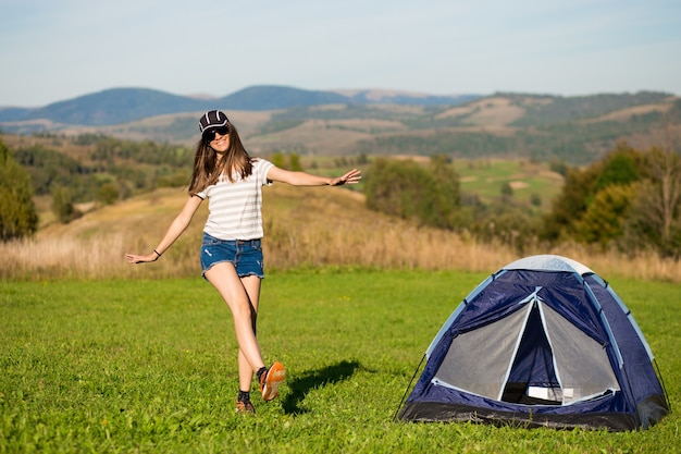 Expressive active young woman posing outdoor