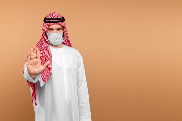 Expressive Arab guy posing