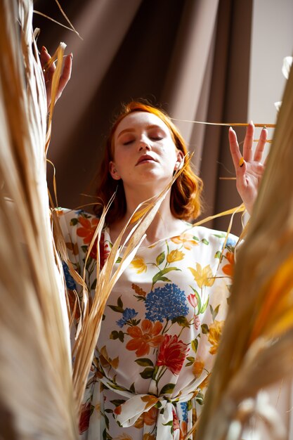 Expressive beautiful woman posing in summer cloths