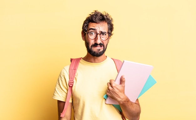 Expressive crazy man feeling sad and whiney with an unhappy look and crying. adult student concept