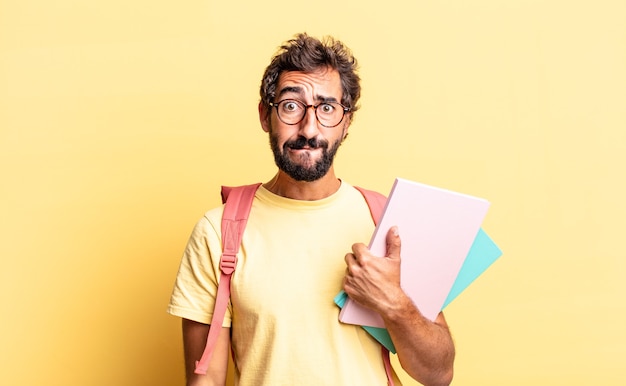 Expressive crazy man looking puzzled and confused. adult student concept