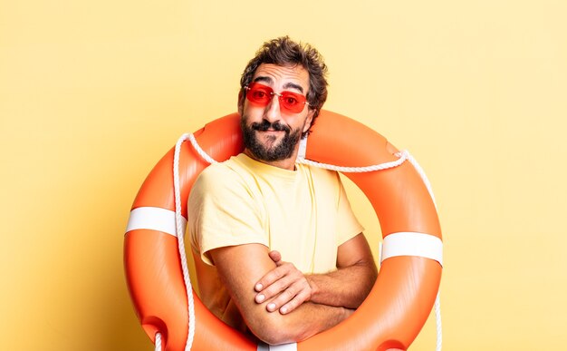 Expressive crazy man shrugging, feeling confused and uncertain. life guard concept