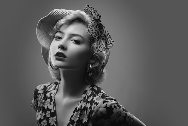 Expressive facial expressions portrait of beautiful woman dressed in pinup style blond model posing