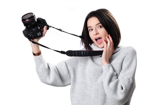 Expressive portrait of a beautiful young brunette woman in a in the studio