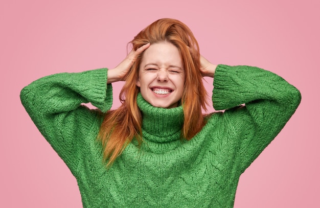 Expressive teenage girl looking super excited