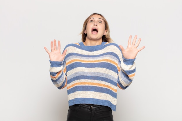 Expressive woman posing in the studio