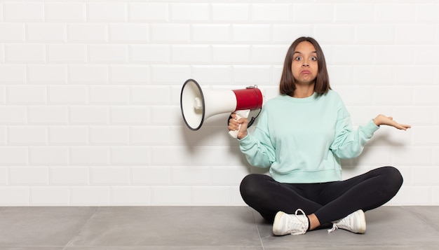 Expressive woman posing in the studio