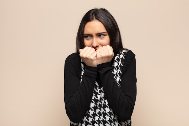 Expressive woman posing in the studio