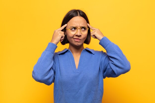 Expressive woman posing in the studio