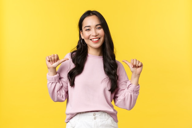 Expressive young Asian girl posing