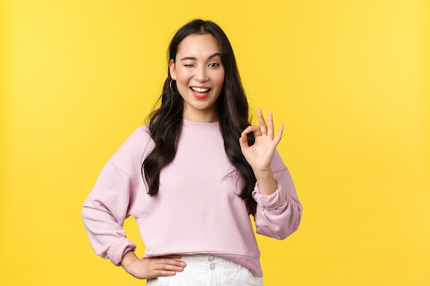 Expressive young asian girl posing