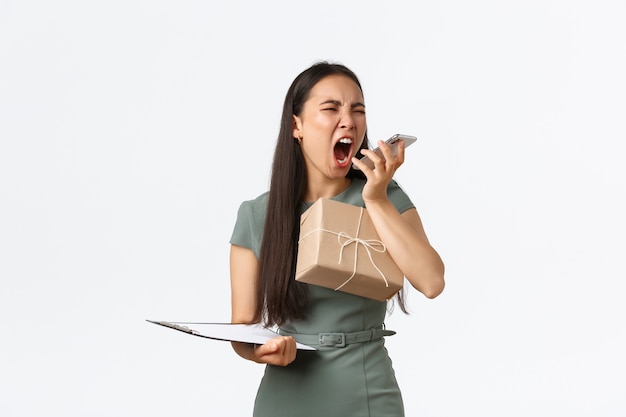 Expressive young Asian woman posing