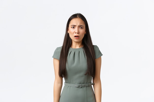 Expressive young Asian woman posing