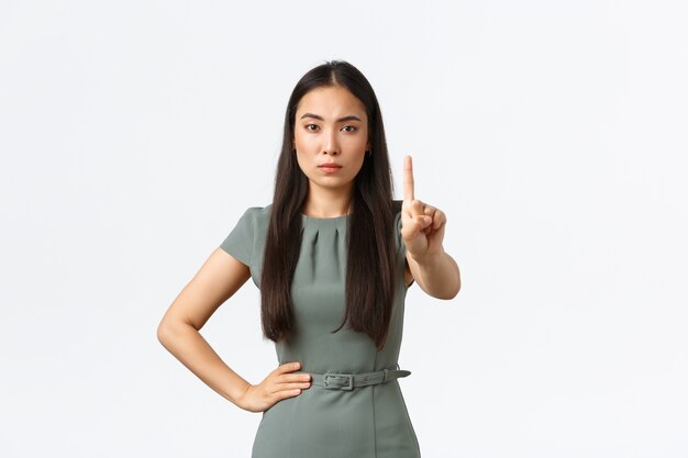 Expressive young Asian woman posing