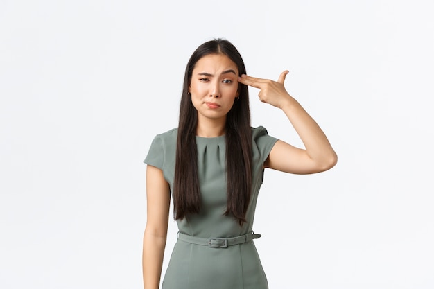 Expressive young Asian woman posing