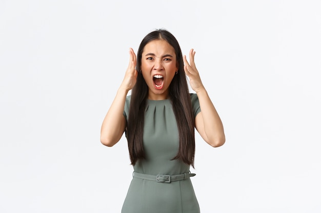 Expressive young Asian woman posing