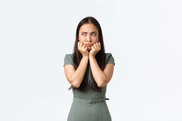 Expressive young Asian woman posing