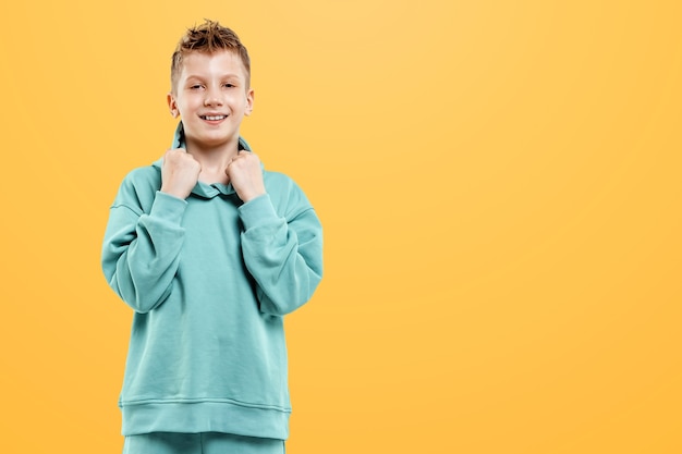 Expressive young boy posing