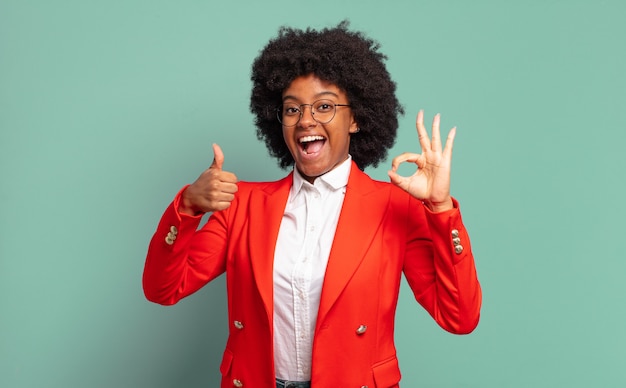 Expressive young pretty black woman gesturing