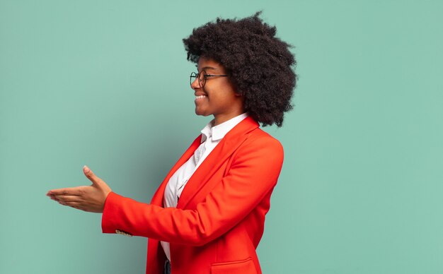 Expressive young pretty black woman gesturing