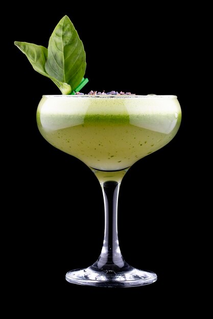 Exquisite cold cocktail with apple and basil on a dark background