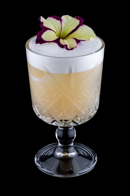 Exquisite cold cocktail with pear and peach on a dark background