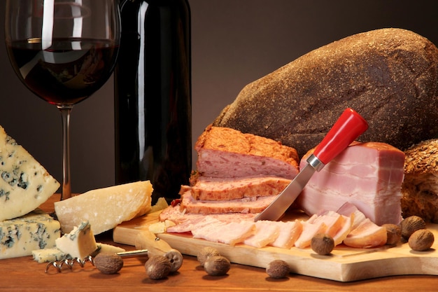 Exquisite still life of wine cheese and meat products