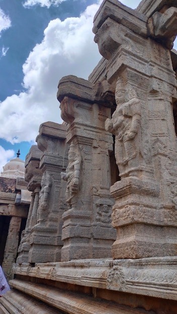 Exquisitely carved beautiful basrelief of Hindu Gods on stone pillars at the ancient Veerabhadra