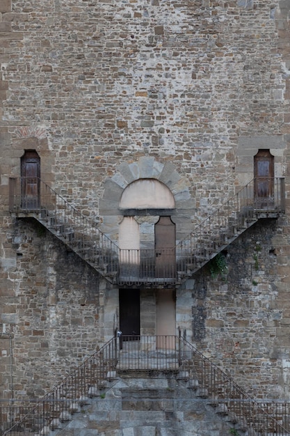 Exterior detail of antique building in Florence Italy with Escher architecture style