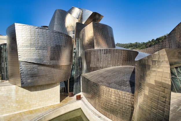 Exterior facade of avant-garde architecture of the guggenheim museum in bilbao