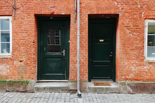 Exterior of house with black doors