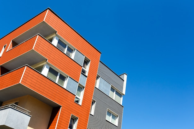 Exterior of a modern  apartment buildings on blue sky 