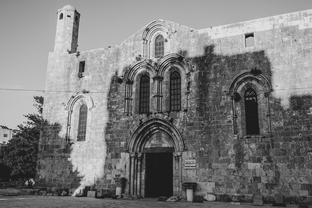 Photo exterior of old building against sky