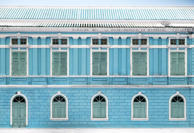 Exterior of vintage building with wood window