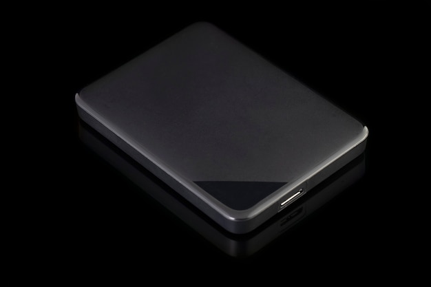 External hard disk isolated on black background