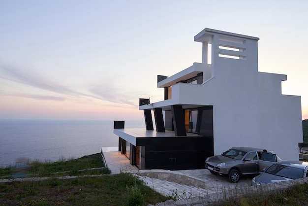 External view of a contemporary house modern villa at  sunset