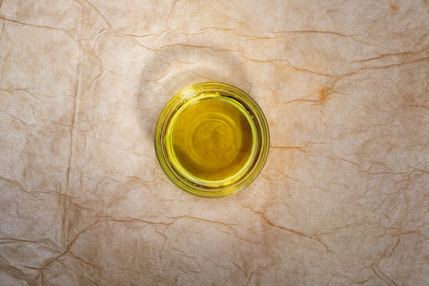 Extra virgin olive oil in glass bowl.