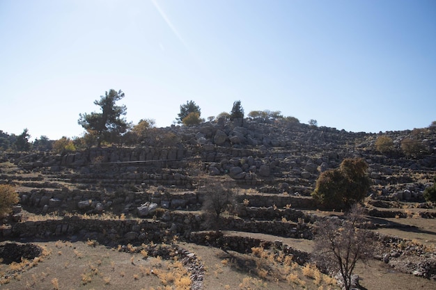 Extraordinary nature old ruins of stones mountains forests roads Beautiful places for tourists The beauty of the perennial nature