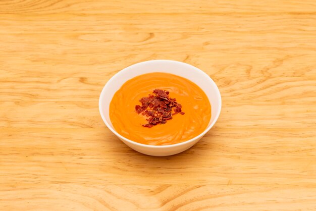 Extremadura salmorejo recipe with crunchy pieces of Iberian ham on top